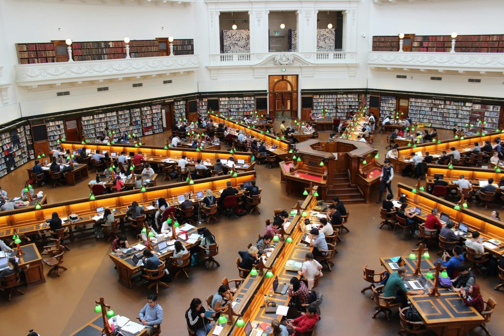 Arial view of a large university library with students studying.