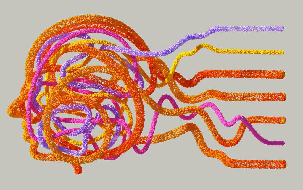 Image of a human head in profile made up of many different colored strings.